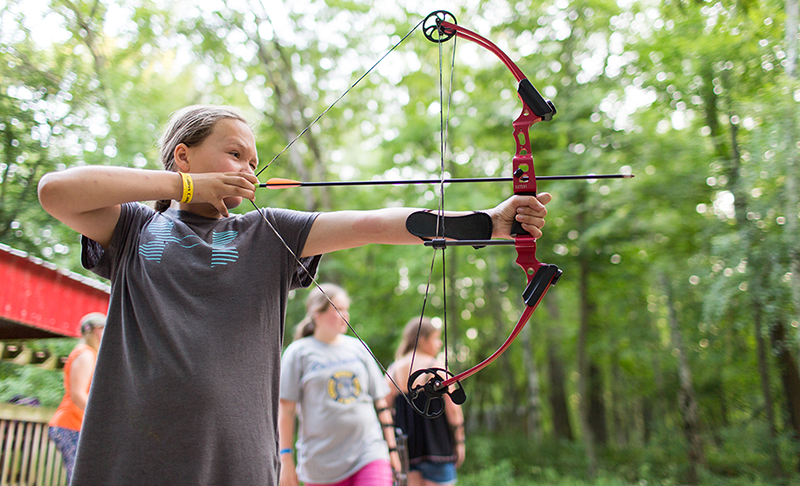 Girl Aiming at Archery Target