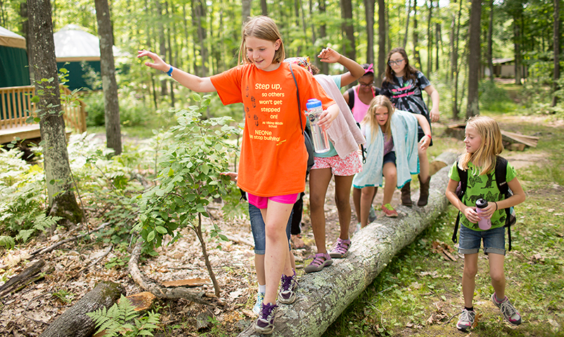 Girls Balancing on a Log