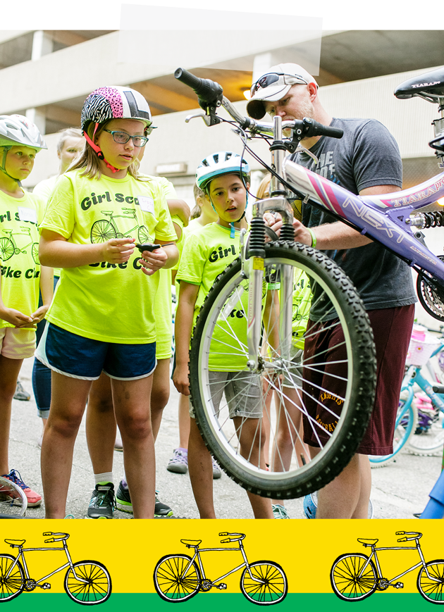 Girls Fixing Bikes